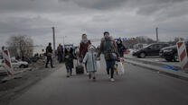  A family of Ukrainian refugees gather at Przemysl railway station.