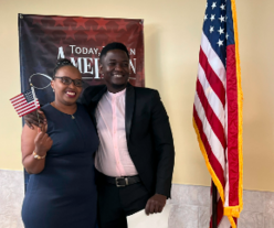 Tonny with his cousin after he completes the oath