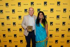 Manuel Vera (left) receiving the New Partner Award from IRC executive director Preethi Nampoothiri (right)