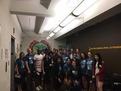 Bloomberg employees gather with IRC clients after a job readiness workshop.