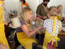 Ukrainian women and girls take part in a pottery class in a Women and Girls Safe space in Milan, Italy.