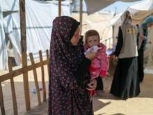 A child receives treatment for malnutrition in Shams Camp, Gaza