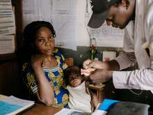 A child receives emergency therapeutic food at Nyemba health centre supported by the IRC.