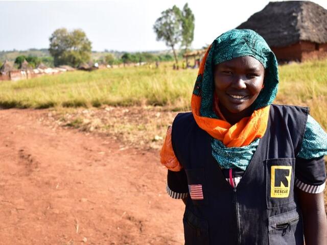 Samia on a road smiling