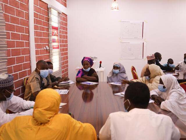 A group discussion around a table