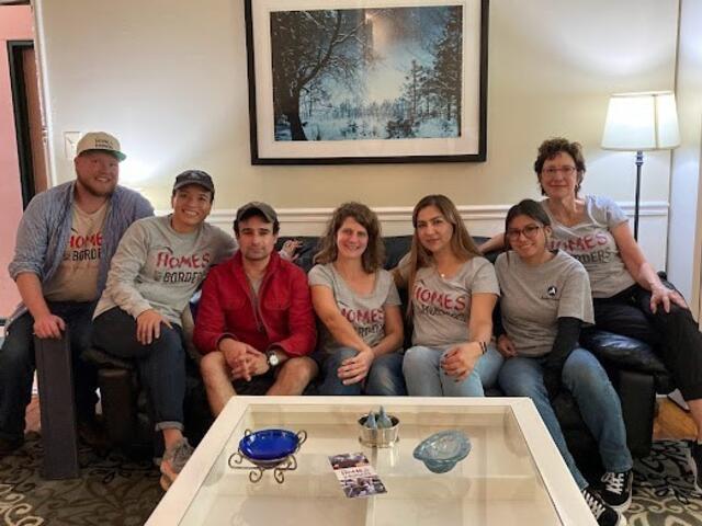 A group gathered in a living room 