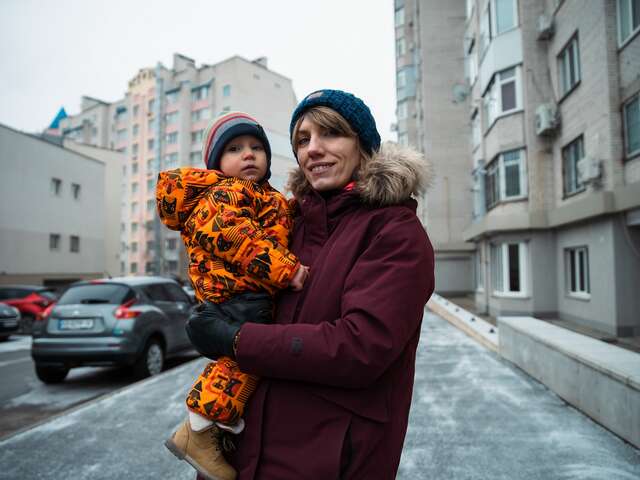 A woman holding her child