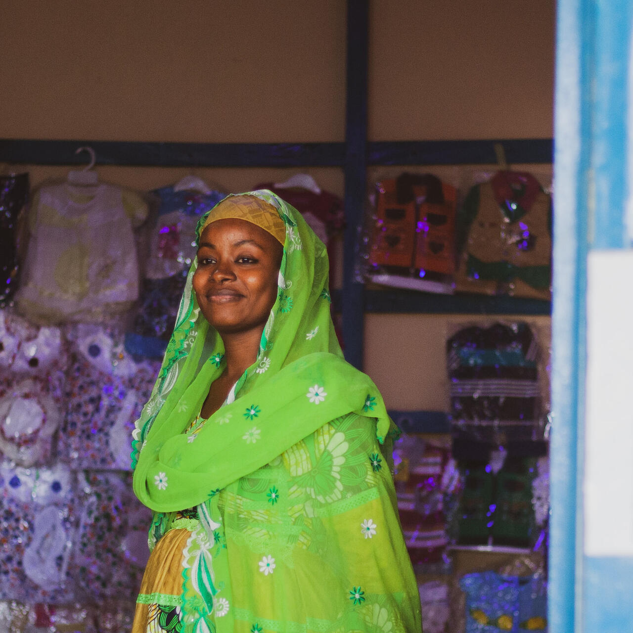 A woman in Cameroon poses for a photo.