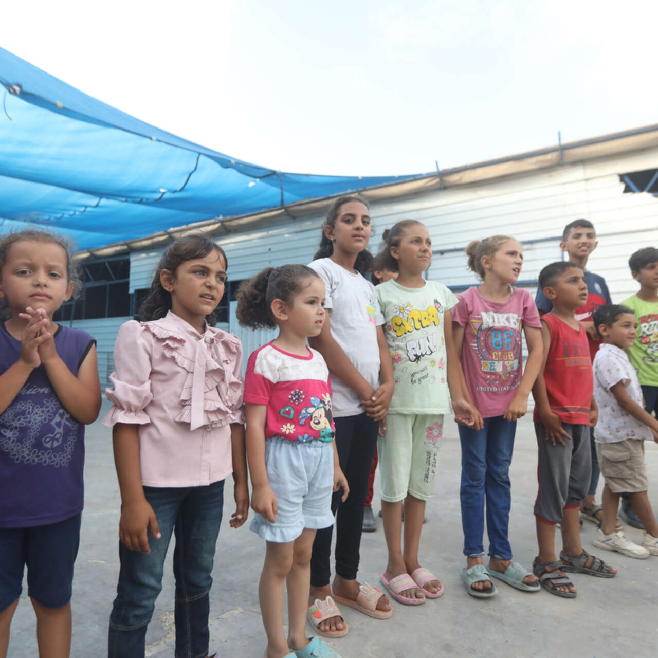 Children take part in a psychosocial support (PSS) session conducted in order to help them overcome the traumatic effects of war.