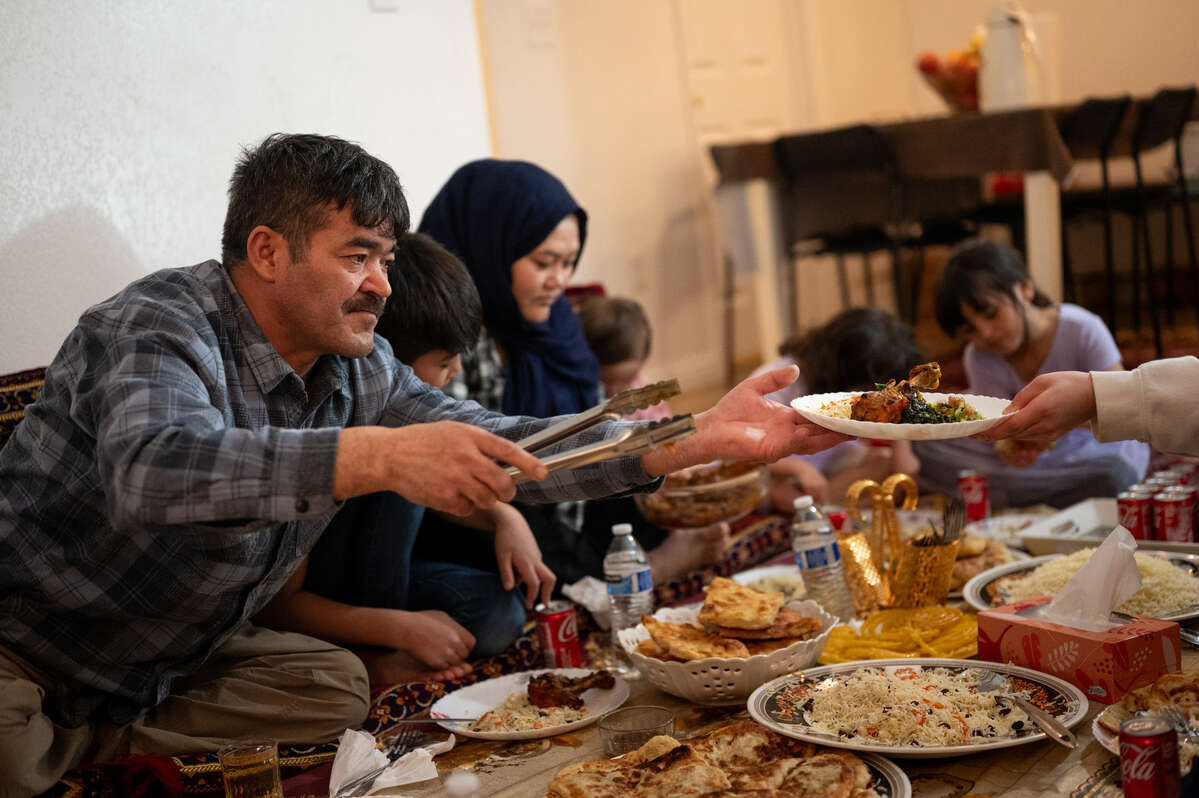 The Hussaini family enjoy an Iftar meal.