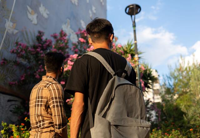 Two young adolescents outside 