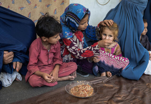 The meal, ready, is served to the women and children who came to take the class.