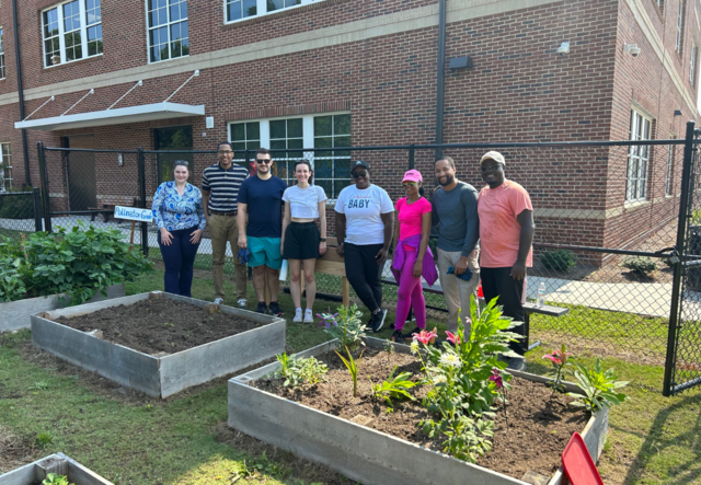 World Affairs Council of Atlanta Youth Leaders standing in their newly-built ADA accessible garden.