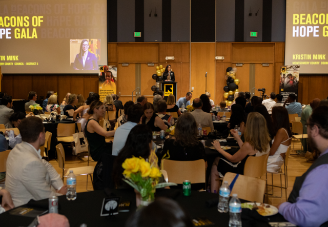 Councilmember Kristin Mink delivers the keynote address at the Beacons of Hope Gala