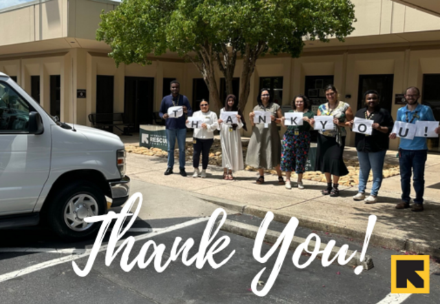 IRC Atlanta staff say thank you for our new vans!