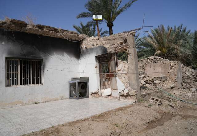 A house stands in ruins in Iraq.