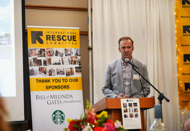 Preston Walls, founder and CEO of Walls Property Management, speaking at IRC's annual benefit dinner, 2024.