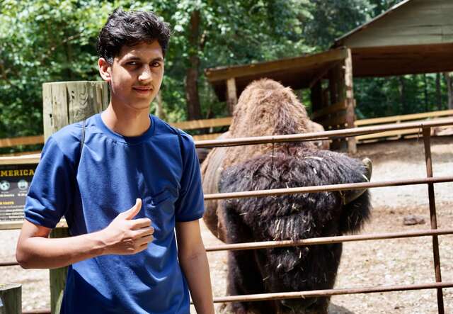 Students on a field trip at summer camp.