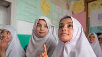 Girls attend an IRC education program in Afghanistan.