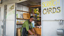 Chantal Rutonda Nyamuco makes mandazi bread at her stand in Nairobi