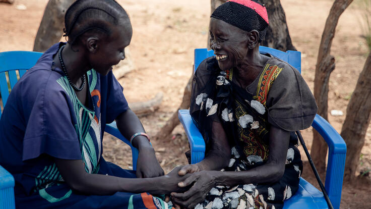 Veronica, 31, talks with her mother, Amou Makuei and support person, in Jamjang, South Sudan