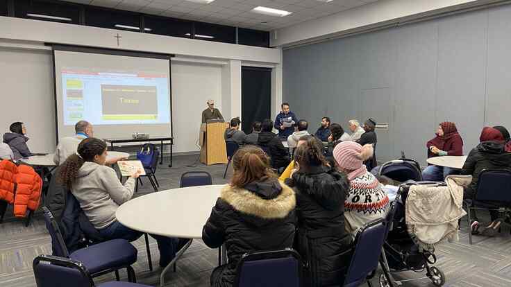 Omar, IRC in NJ's Acting Interim Economic Empowerment Manager, gives a presentation about Taxes